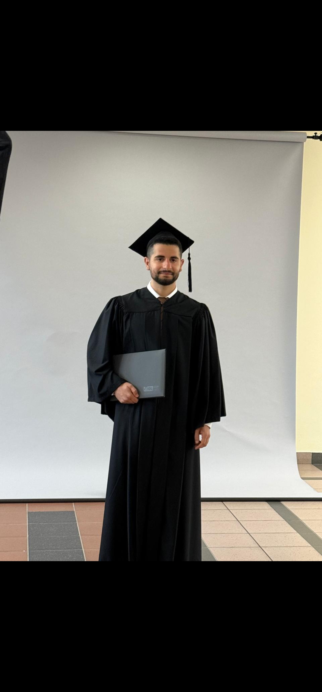 Joseph at his Computer Science graduation